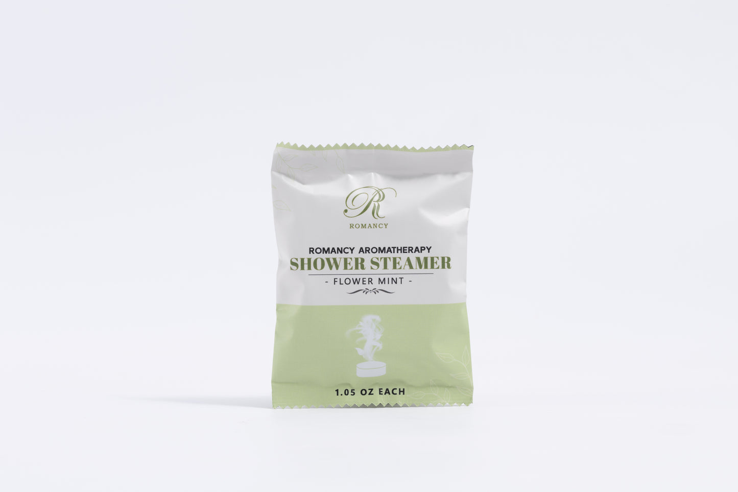 Romancy aromatherapy shower steamer packet in Flower Mint scent on a white background

